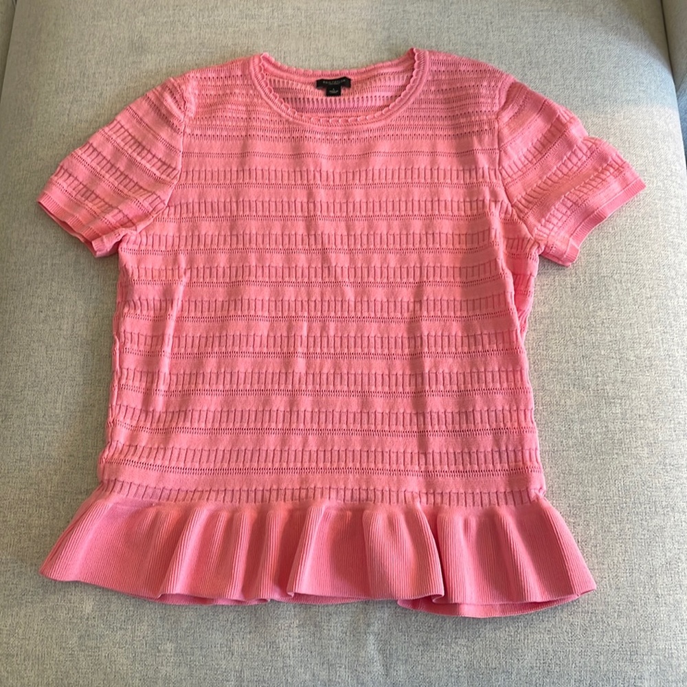 Coral pink peplum sweater